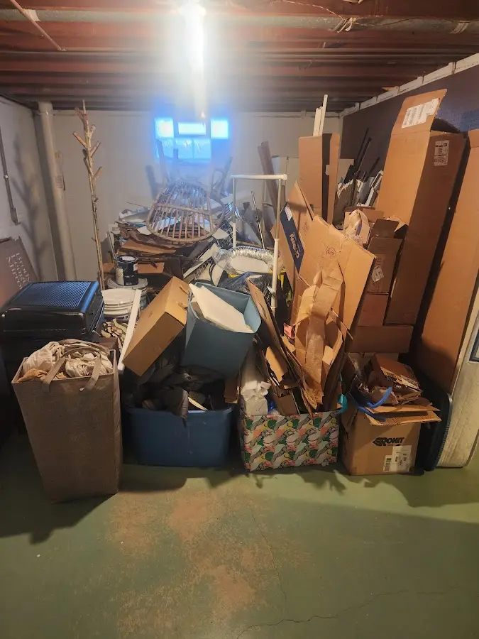 Roll-off dumpster container at job site for 20 Yard Dumpster Rental in Ware